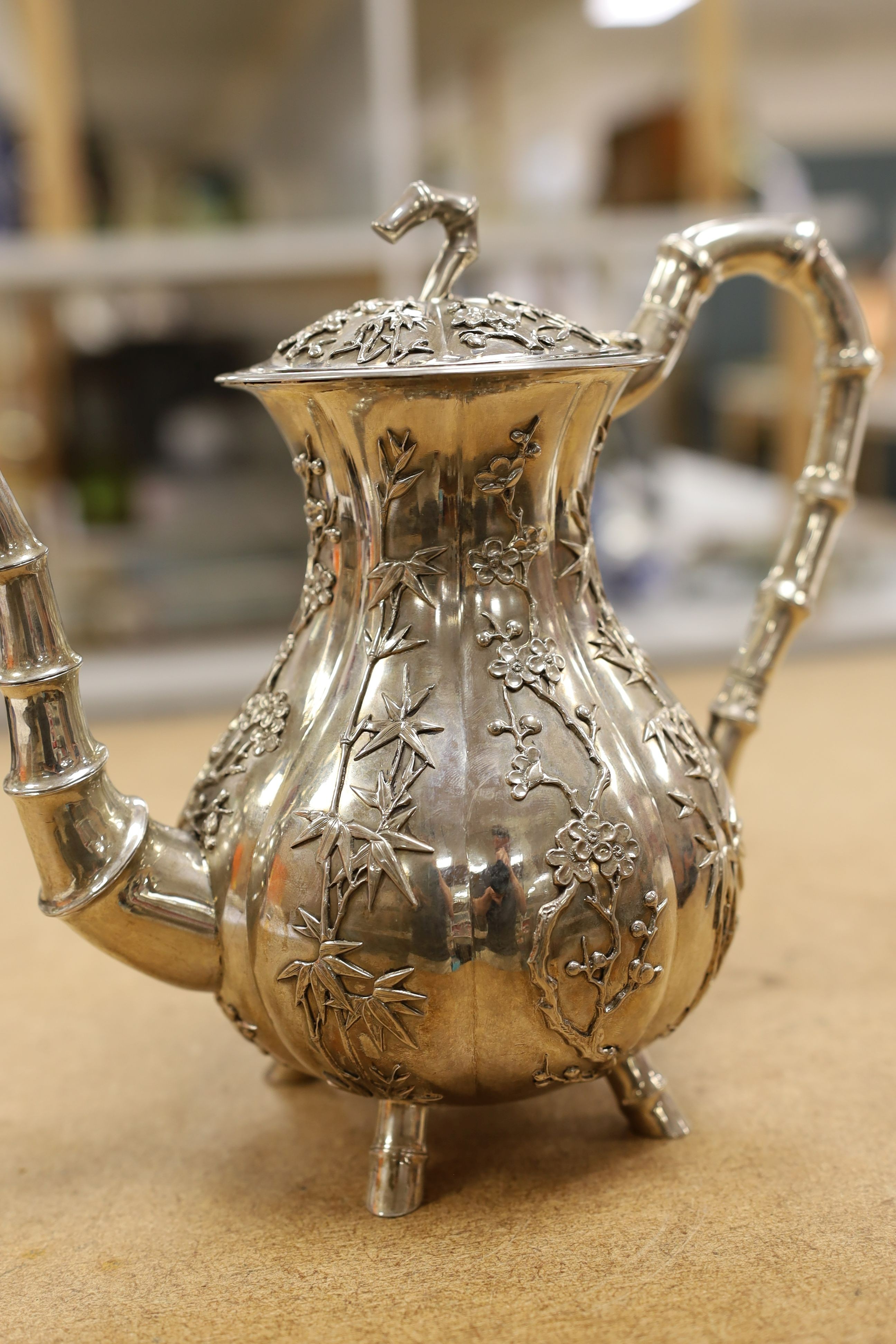 A late 19th/early 20th century Chinese Export white metal coffee pot by Hung Chong, height 20.3cm, gross weight 23.5oz.